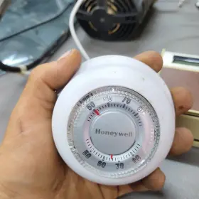 50008436 Honeywell Round Thermostat Manual Wall 001
