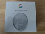 Google Nest Smart Thermostat, Fog - New In Box. Price: $85.00.