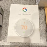 Google Nest Thermostat Wi Fi App Control 7-DAY Programmable, White Round Open. Price: $25.00.