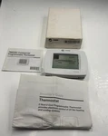 Trane BAYSTAT052A / TB8220U1029 Commercial Vision Programmable Thermostat New. Price: $350.00.