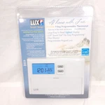 Lux Smart Temp TX9100E 7 Day Programmable Thermostat Universal New Sealed. Price: $134.99.