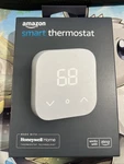 Amazon Smart Thermostat - Works With Alexa And Ring New / Sealed. Price: $32.99.