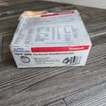 Honeywell T87F 1859 Round Heating Cooling Thermostat With Base And Wall Plate Open. Price: $57.16.