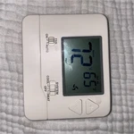 White Digital Non-programmable Thermostat Electric Push Button Wall-mounted Used. Price: $15.00.