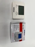 Tuttokool TK-701 Non-programmable Digital Thermostat New. Price: $42.00.