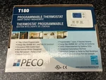 Peco T180 Programmable Thermostat New. Price: $27.00.