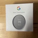 Google G4CVZ Nest Smart Programmable Wi-fi Thermostat Charcoal Gray Box*. Price: $44.99.