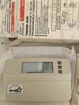 Honeywell T8600D-2028 Programable Thermostat New In Worn Box. Price: $29.00.