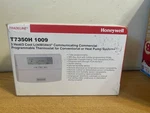 New Honeywell T7350H 1009 Commercial Heat Cool Programmable Thermostat Nib. Price: $350.00.