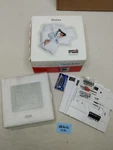 Bryant Legacy Thermostat Programmable T2-PAC01-A New-old Stock. Price: $172.90.