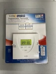 Lux LP0511D Smart Temp 5/2-DAY Programable Thermostat Brand New Sealed. Price: $6.99.