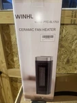 The Winhl Model PTC-SL1703 Ceramic Fan Heater Is Portable Nib I.s. New. Price: $45.00.