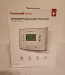 Honeywell Home RTH2300B 5-2 Day Programmable Thermostat, Backlit, White Open. Price: $15.00.