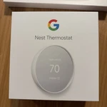 Google Nest G4CVZ Programmable Wi-fi Thermostat Snow Open. Price: $95.00.