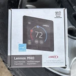 Lennox M40 Wi-fi Smart Programmable Thermostat, Touch Digital, Black New. Price: $400.00.