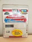 Luxlight Tx 9000. Smart Programmable Thermostat Open. Price: $40.00.