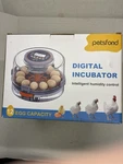 Incubator With Automatic Turning And Humidity Control 12 Eggs New. Price: $35.00.