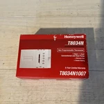 Honeywell T8034N1007 Single-stage Thermostat, White Open. Price: $24.99.