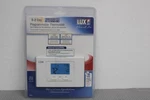 Lux TX500U 5/2 Day Programmable Thermostat White Digital Display New Sealed. Price: $49.99.