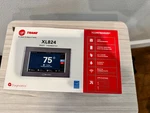 Trane XL824 Smart Thermostat Wifi Touchscreen TCONT824AS52DA New. Price: $275.00.