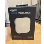 New Amazon Smart Thermostat Wi Fi, Alexa, Touch Programmable, White W/trim Plate Open. Price: $25.00.