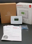 Honeywell 5-1-1 Day Programmable Thermostat Model RTH2410B Open. Price: $14.99.