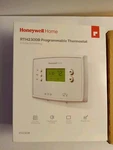 Honeywell RTH7000 Programmable Thermostat With Universal Guard Sealed Open. Price: $20.00.