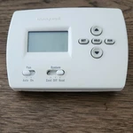 Honeywell 4000 5-2 Day Programmable Thermostat (TH4110D1007) Used. Price: $50.00.