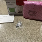 Uni-line Perfectsense Touchscreen Thermostat PS4000 New Open Box. Price: $32.00.
