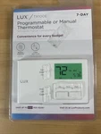 Lux Programmable Or Manual Heat & Cool Thermostat TX100E New Sealed. Price: $26.70.