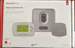 Honeywell Wireless Thermostat Kit THM5320R1000, TH6320R10004, C7735A1000 New. Price: $300.00.