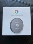 Google Nest Smart Thermostat, Charcoal GA02081-US -sealed New. Price: $60.00.