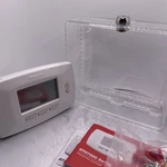 Honeywell Programmable Thermostat RTH7400CG/UNIVERSAL Guard Used. Price: $33.99.