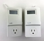 (2) Lux WIN100 5-2 Day Heating & Cooling Programmable Outlet Thermostat Used. Price: $34.00.