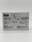 Robertshaw RS1110 5-1-1 Day Programmable Thermostat Heat / Cool Blue Lcd New. Price: $29.99.