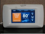 Goodman CTK04AE Comfortnet Communicating Thermostat - Model THX9001R5029 Used. Price: $295.00.