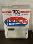 Lux HP2110 Programmable Heat Pump Thermostat New Open Box. Price: $30.00.