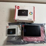 Rheem RETST800SYS Wi-fi- Enabled Touchscreen Heating & Cooling Smart Thermostat Open. Price: $179.99.